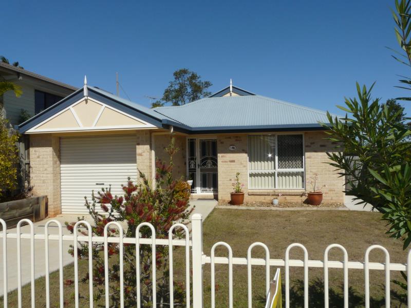 PRICE SLASHED! MODERN BRICK HOME!