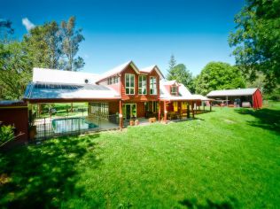 Set on 5 riverfront acres 